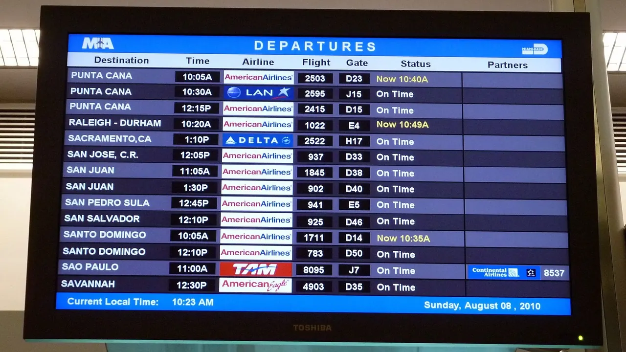 Departures board at Miami Airport in Florida, US