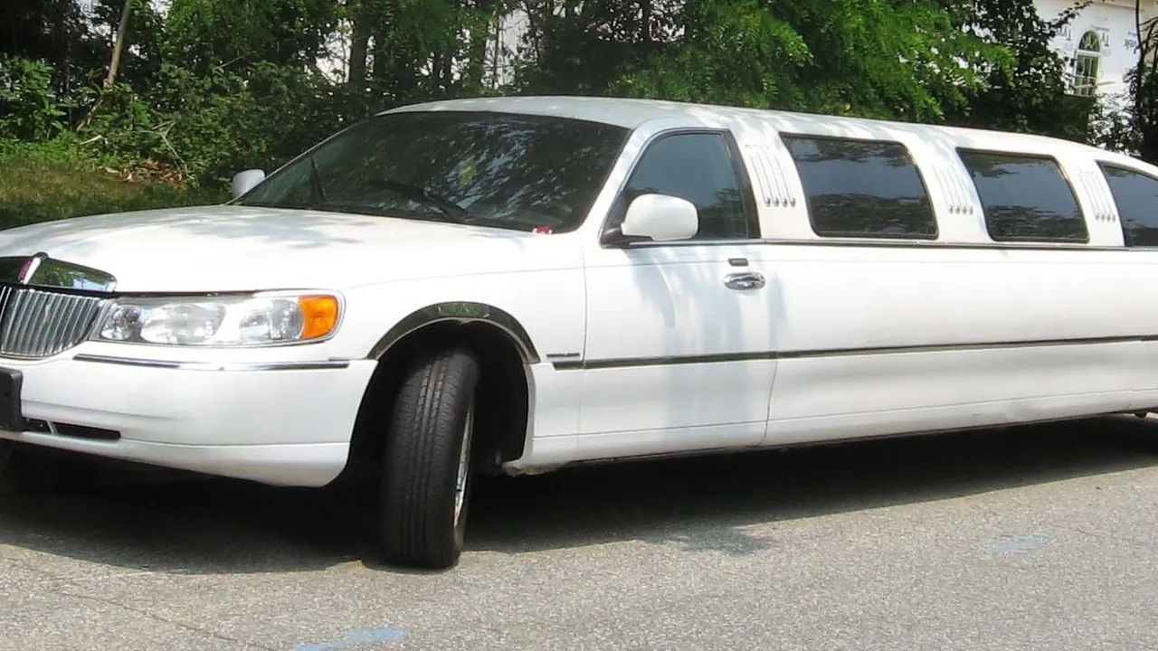 White Lincoln Town Car stretch limousine